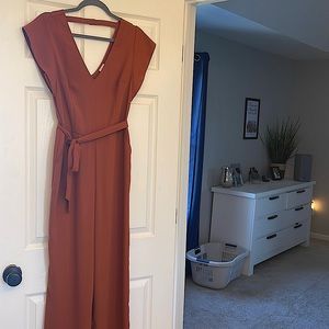 Jumpsuit with tie. Beautiful